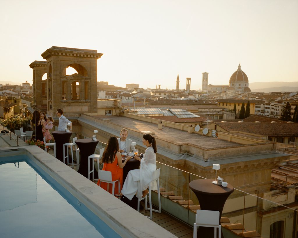 “Our welcome party took place on the rooftop of Hotel Plaza Lucchesi with a 360degree view of Florence  the Duomo on one...