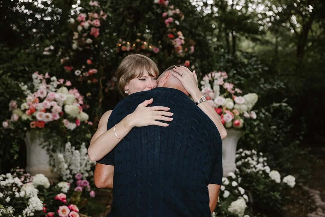 Image may contain Taylor Swift Accessories Bracelet Jewelry Person Hugging and Baby