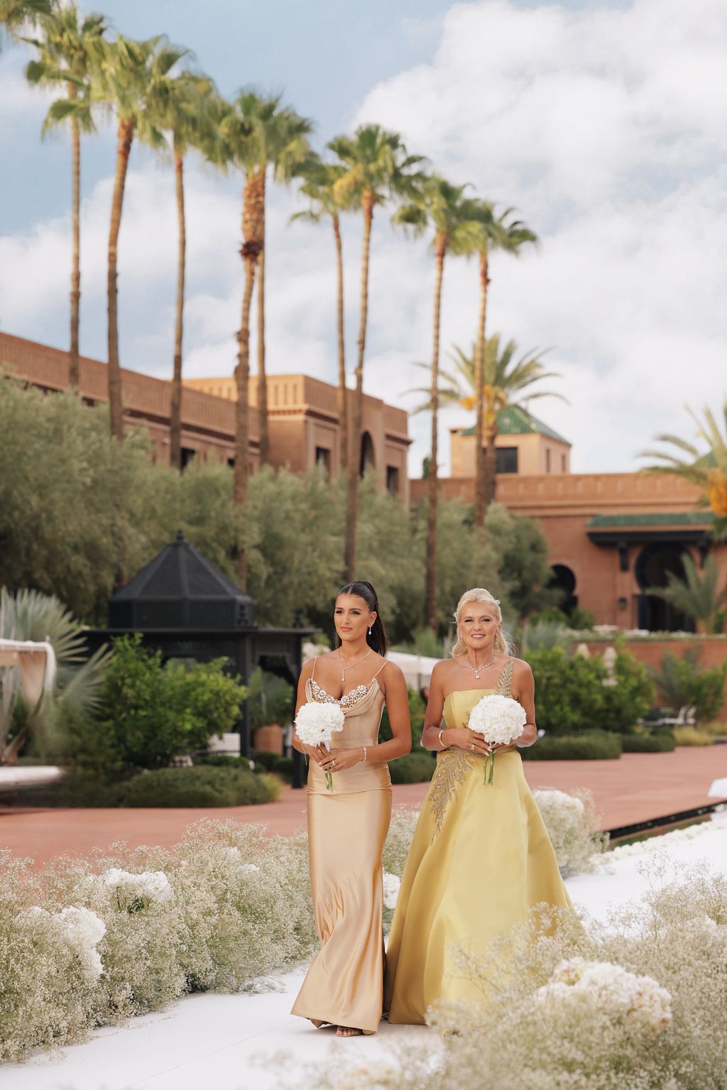 “My mom and sister making their way down the aisle looking simply angelic. Felix and I love them more than anything.” —Nina