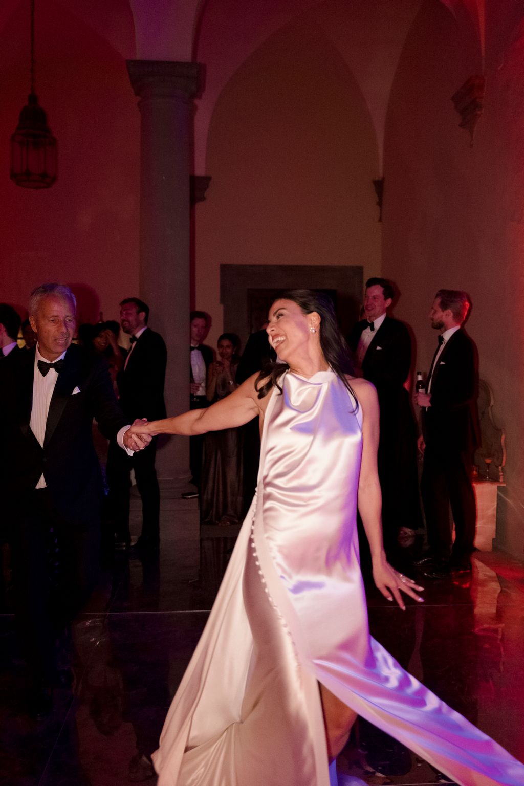 “For my third look I slipped into a slinky silk highneck dress from Danielle Frankel which I had also worn for our civil...