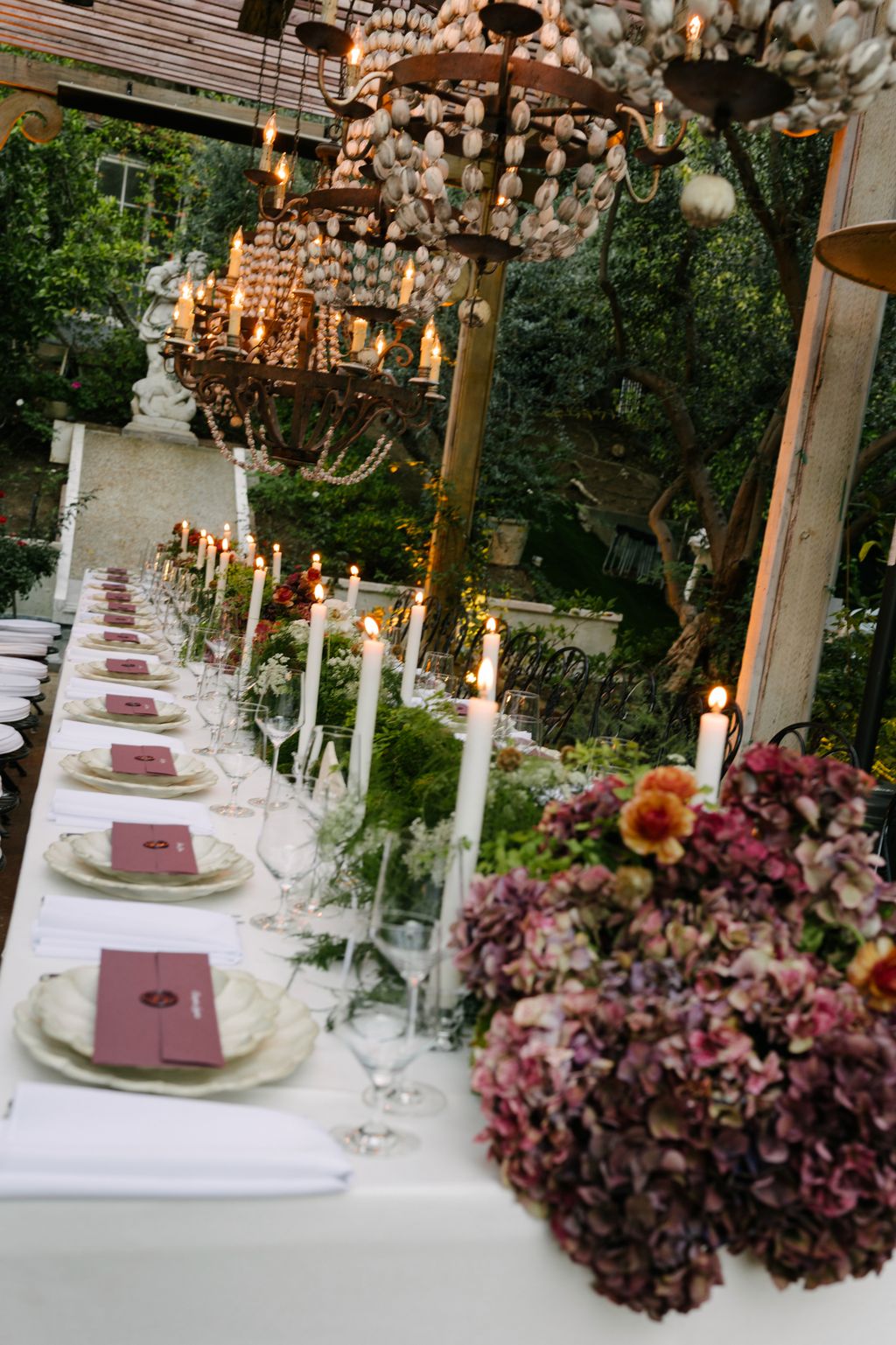 Moss and hydrangeas ran down the tables.
