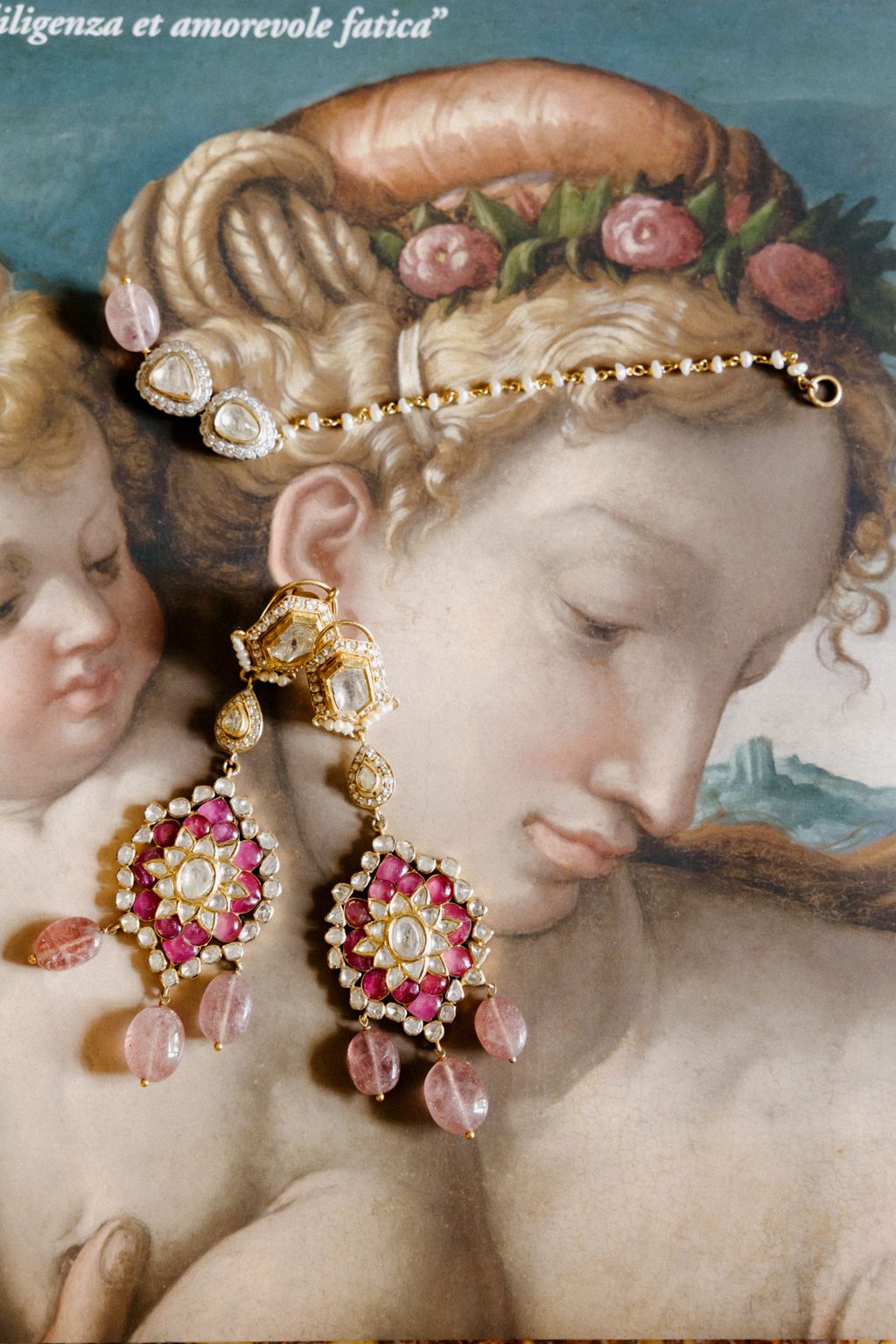 Image may contain Giulio Romano MarcAntoine Charpentier Accessories Earring Jewelry Baby Person Art and Necklace