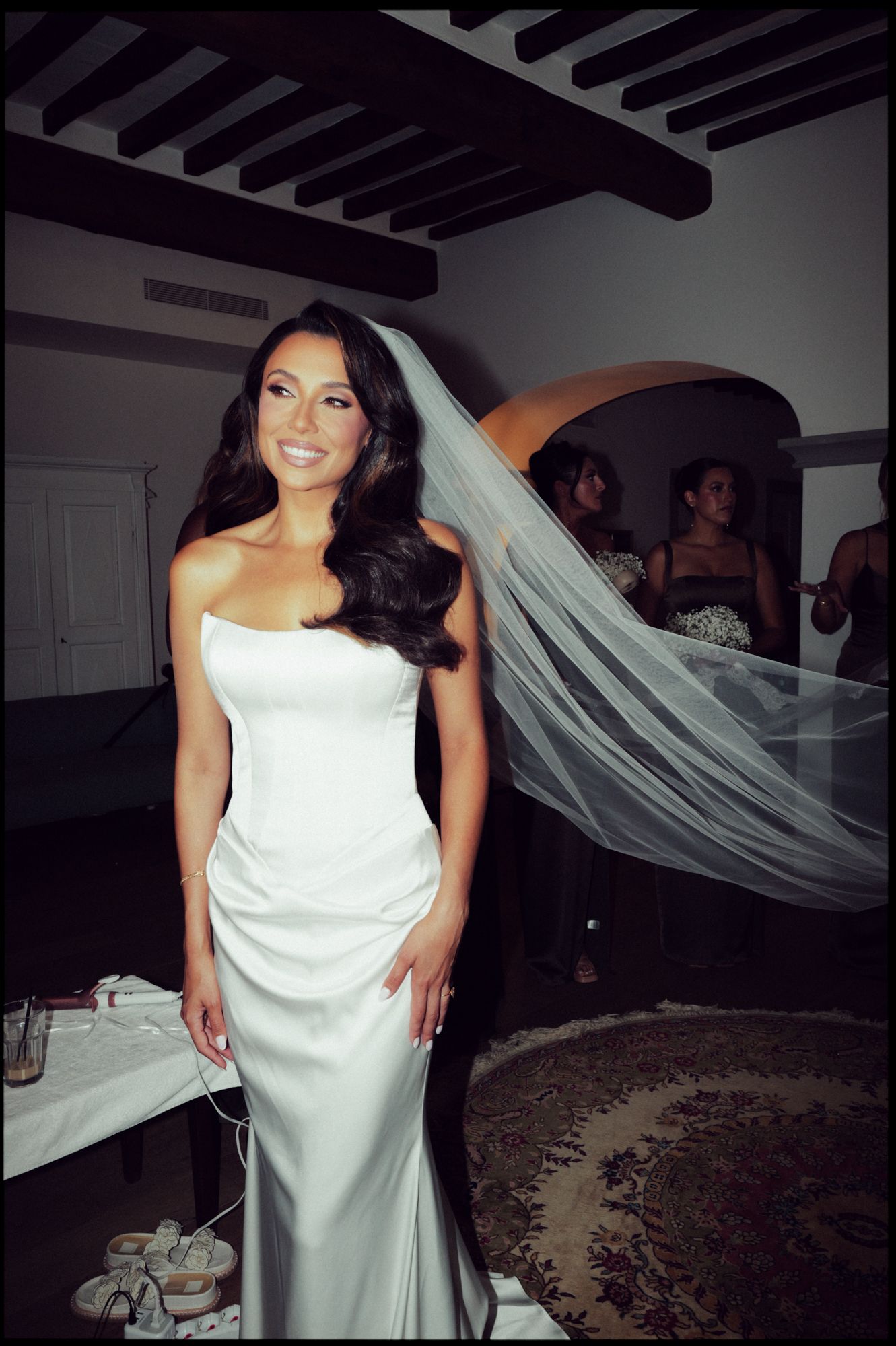 Image may contain Clothing Dress Formal Wear Fashion Gown Wedding Wedding Gown Evening Dress Face Head and Person