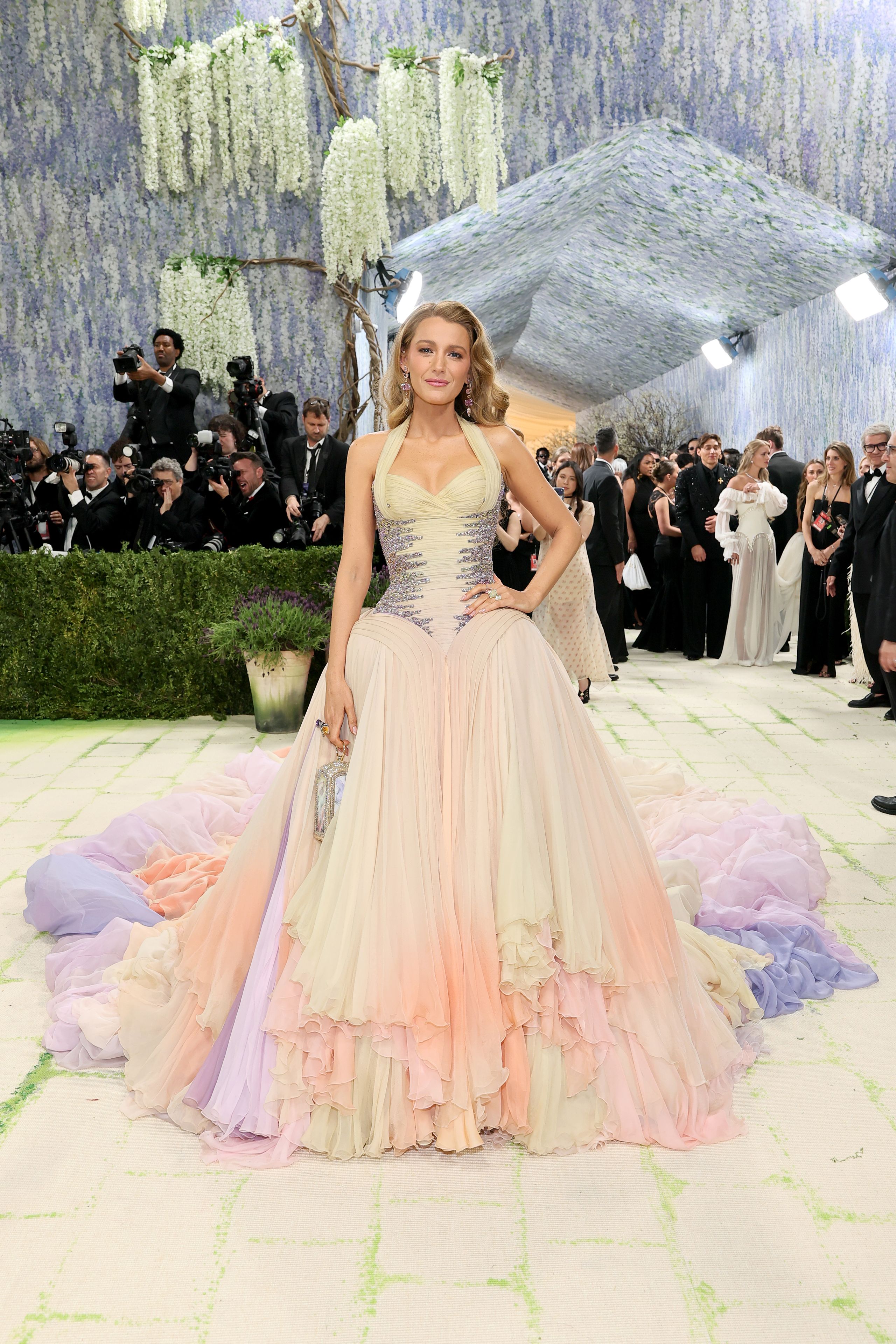 Image may contain Blake Lively Clothing Dress Fashion Formal Wear Gown Wedding Wedding Gown Adult and Person