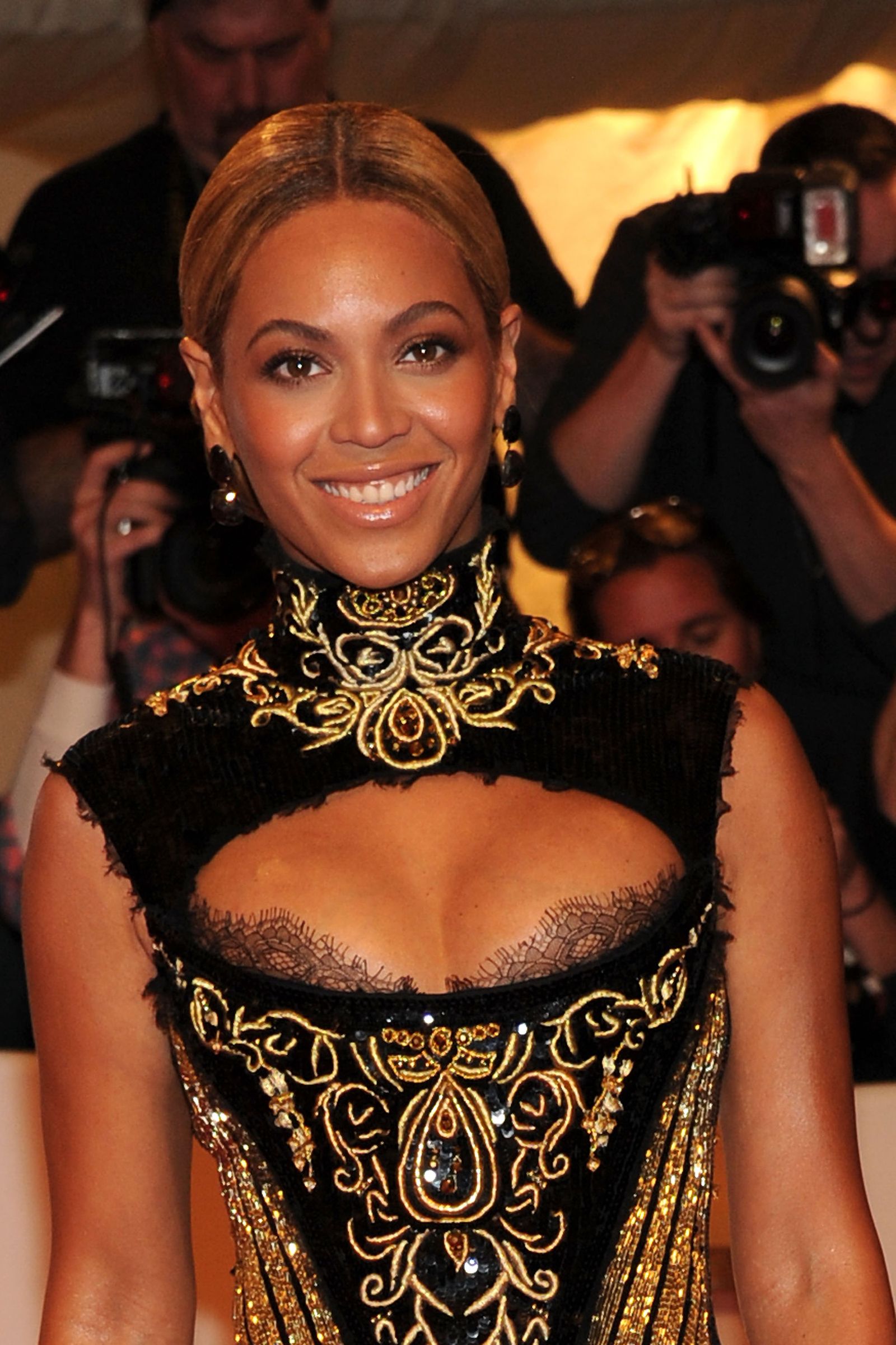 Image may contain Beyonc Photography Adult Person Wedding Camera Electronics Face Head Fashion and Photobombing