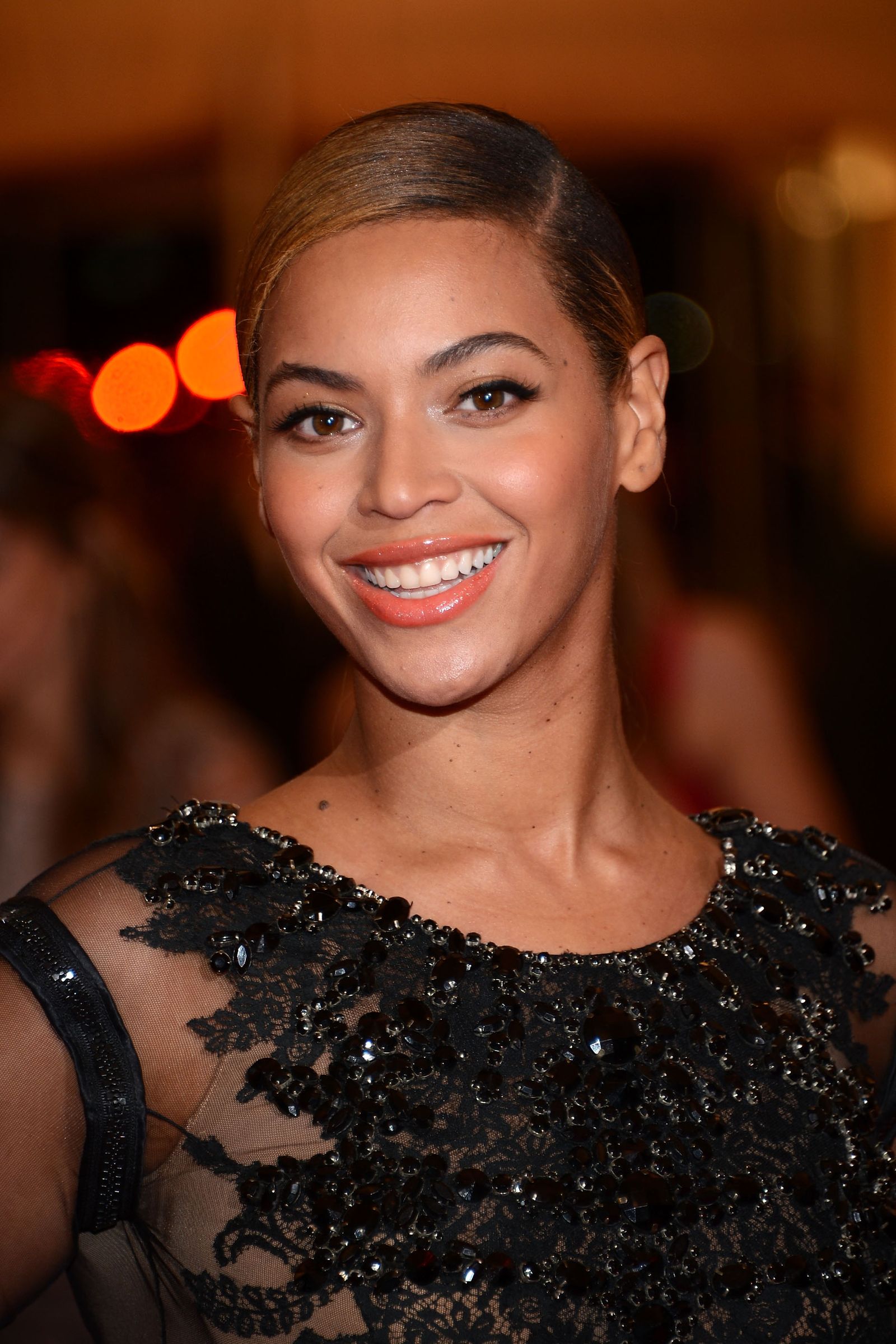 Image may contain Beyonc Face Head Person Dimples Adult Wedding Body Part Neck Happy and Smile