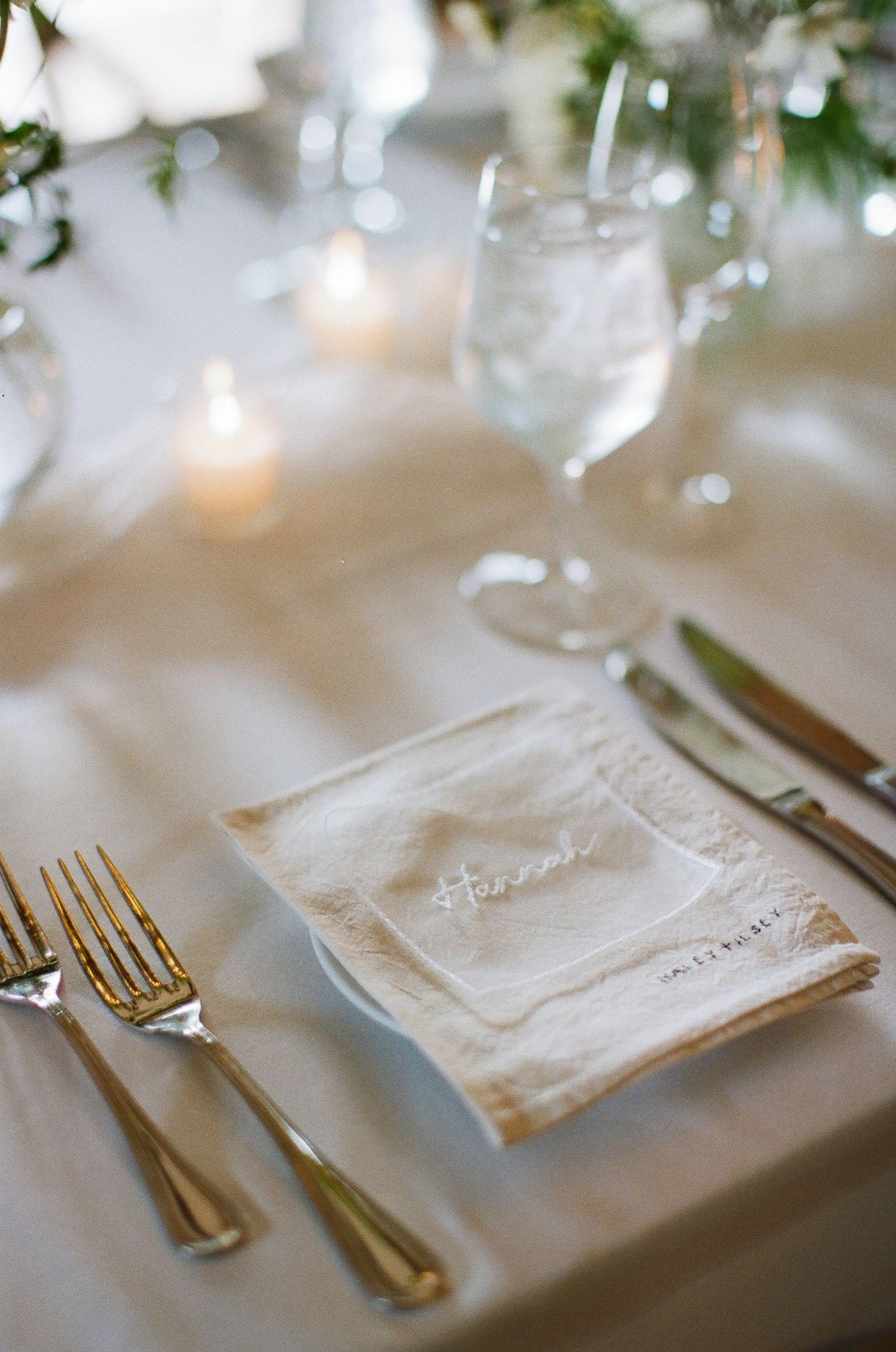 Image may contain Cutlery Fork Home Decor Linen Blade Knife Weapon Napkin Glass Furniture Table and Candle