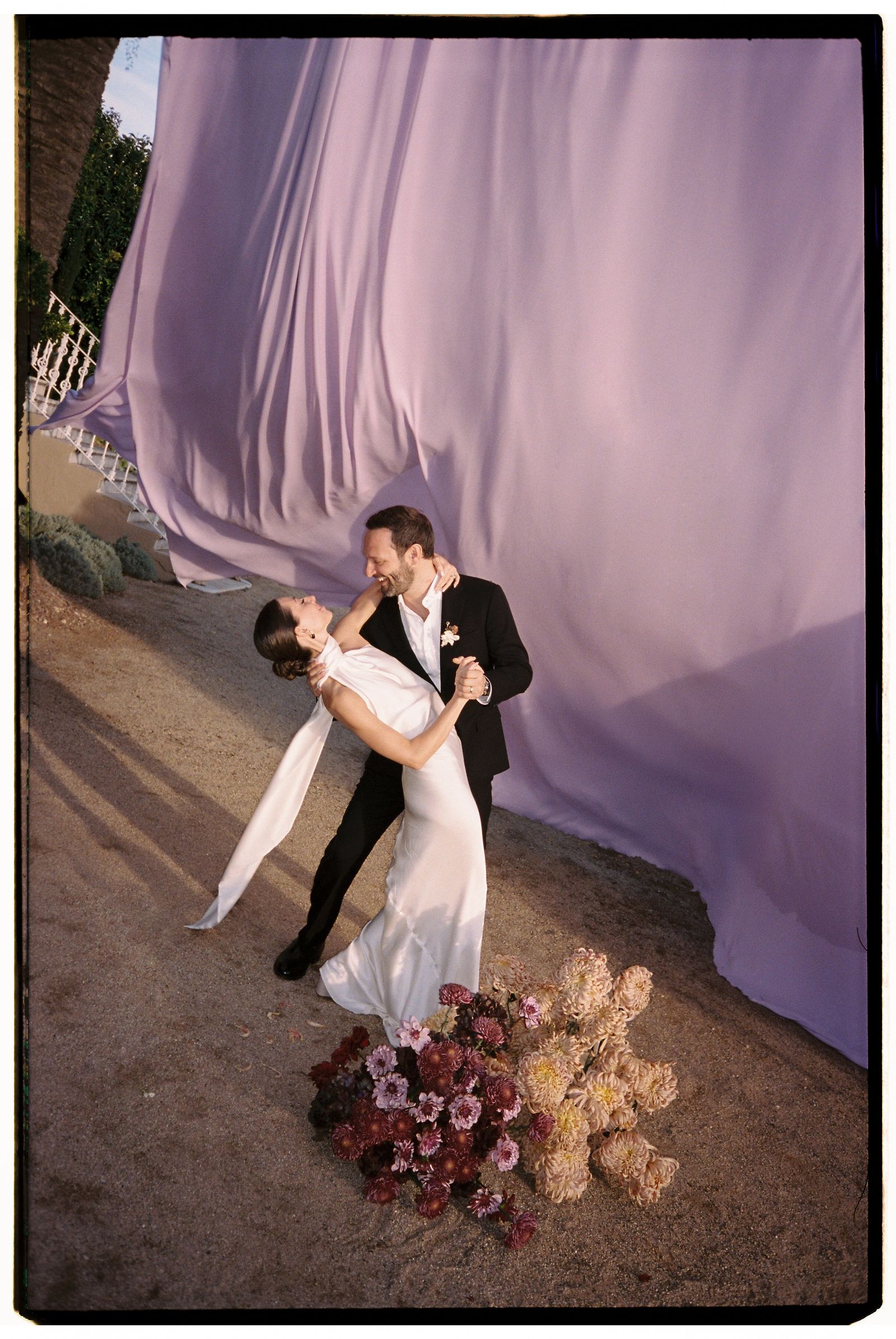 Image may contain Alasdair Roberts Flower Flower Arrangement Flower Bouquet Plant Clothing Dress and Formal Wear