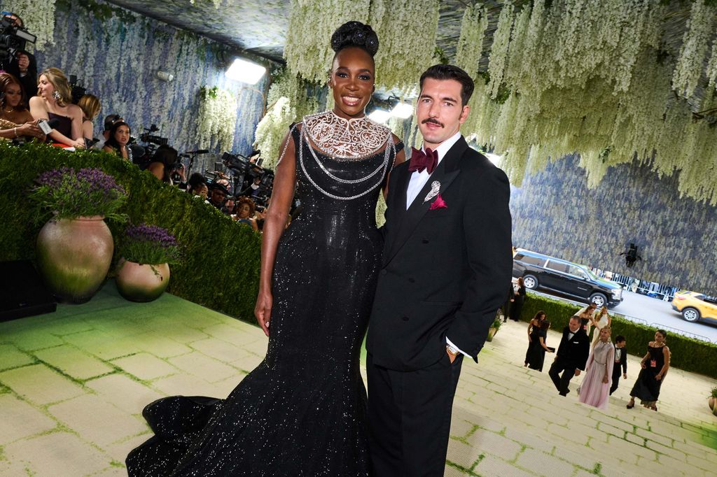 Image may contain Venus Williams Formal Wear Clothing Suit Blazer Coat Jacket Fashion Dress Adult and Person