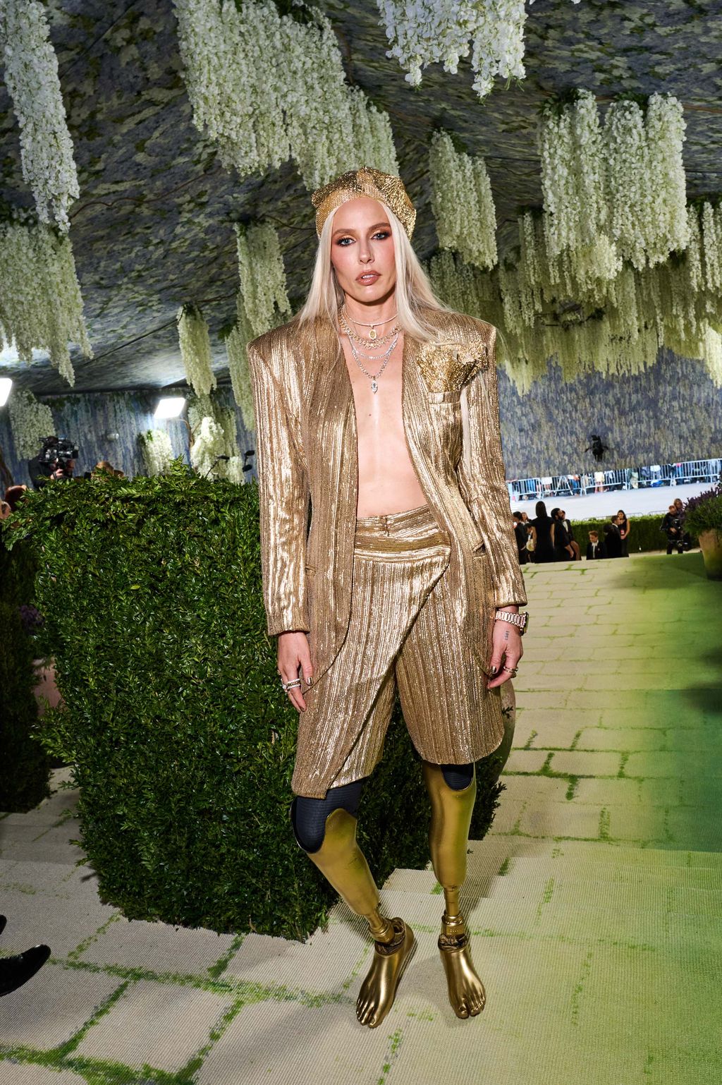 Image may contain Blonde Hair Person Adult Clothing and Coat