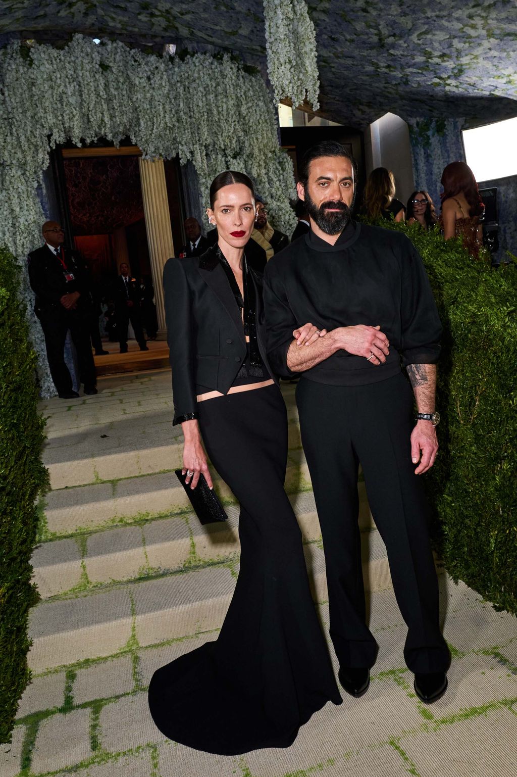 Image may contain Morgan Spector Rebecca Hall Clarence Thomas Person Photobombing Adult Clothing Footwear and Shoe