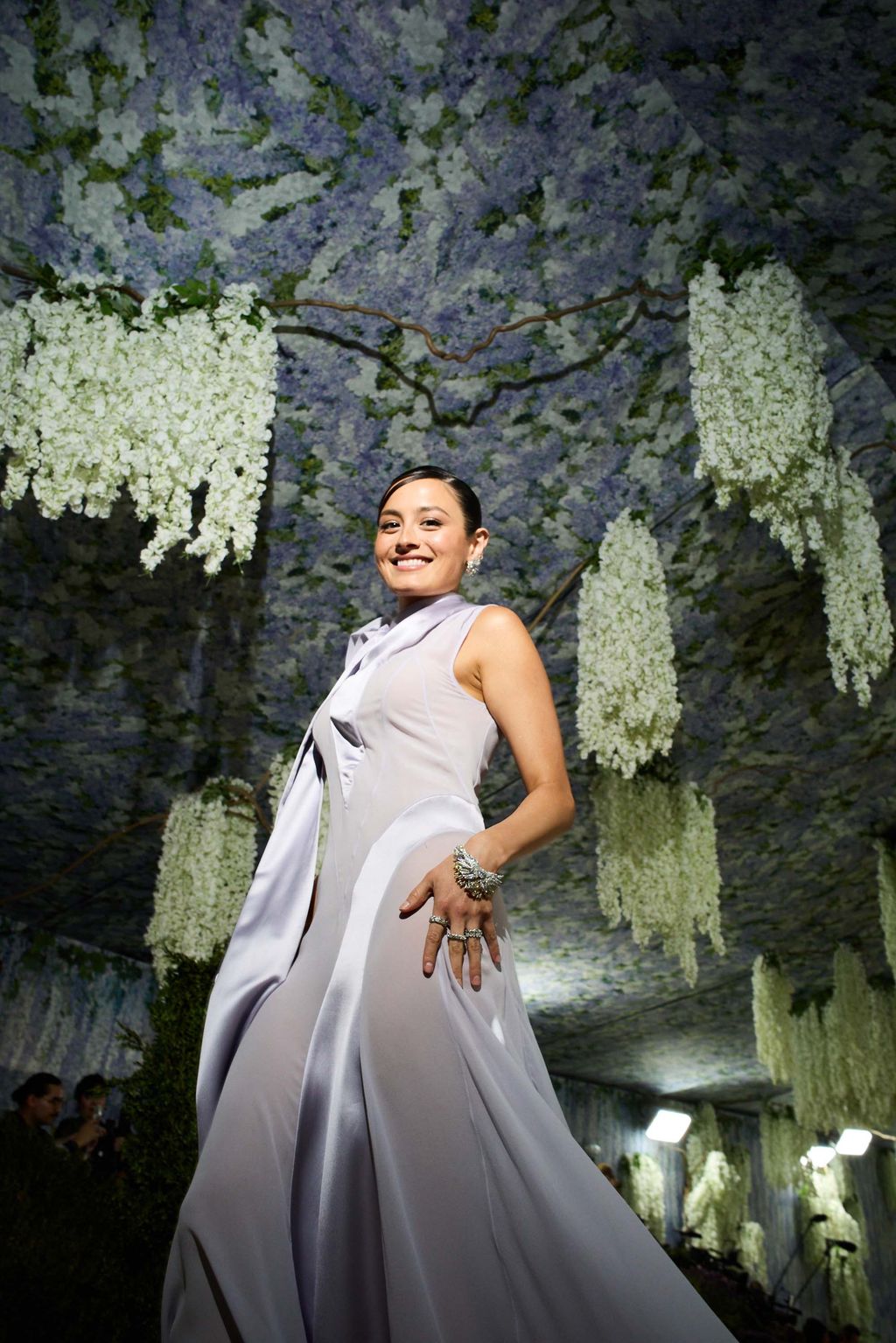 Image may contain Clothing Dress Formal Wear Evening Dress Adult Person Fashion Gown Wedding Wedding Gown and Face