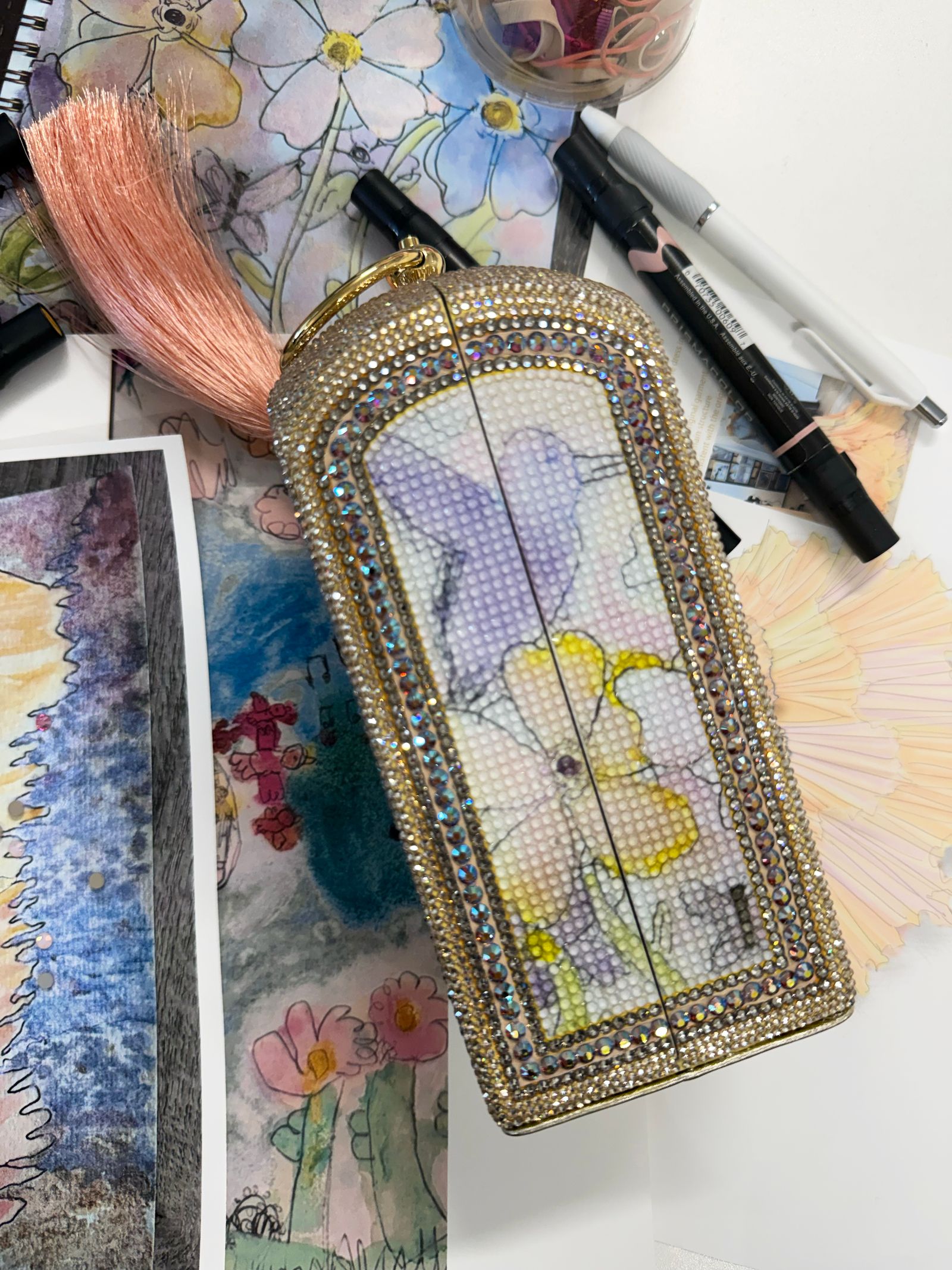 Image may contain Art Handicraft Pen Accessories and Wallet