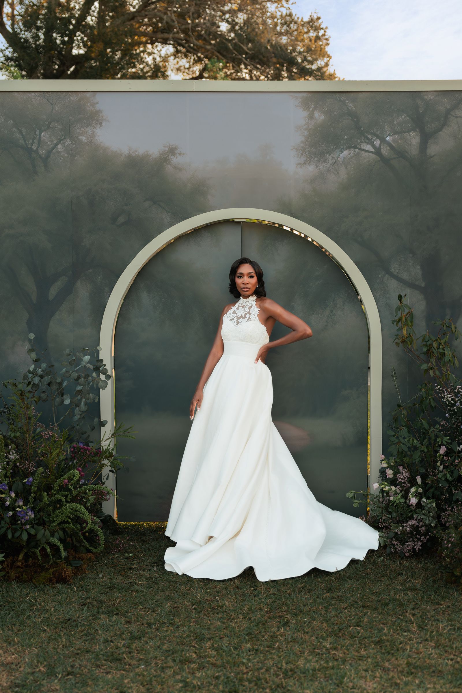 Image may contain Venus Williams Clothing Dress Fashion Formal Wear Gown Wedding Wedding Gown and Evening Dress