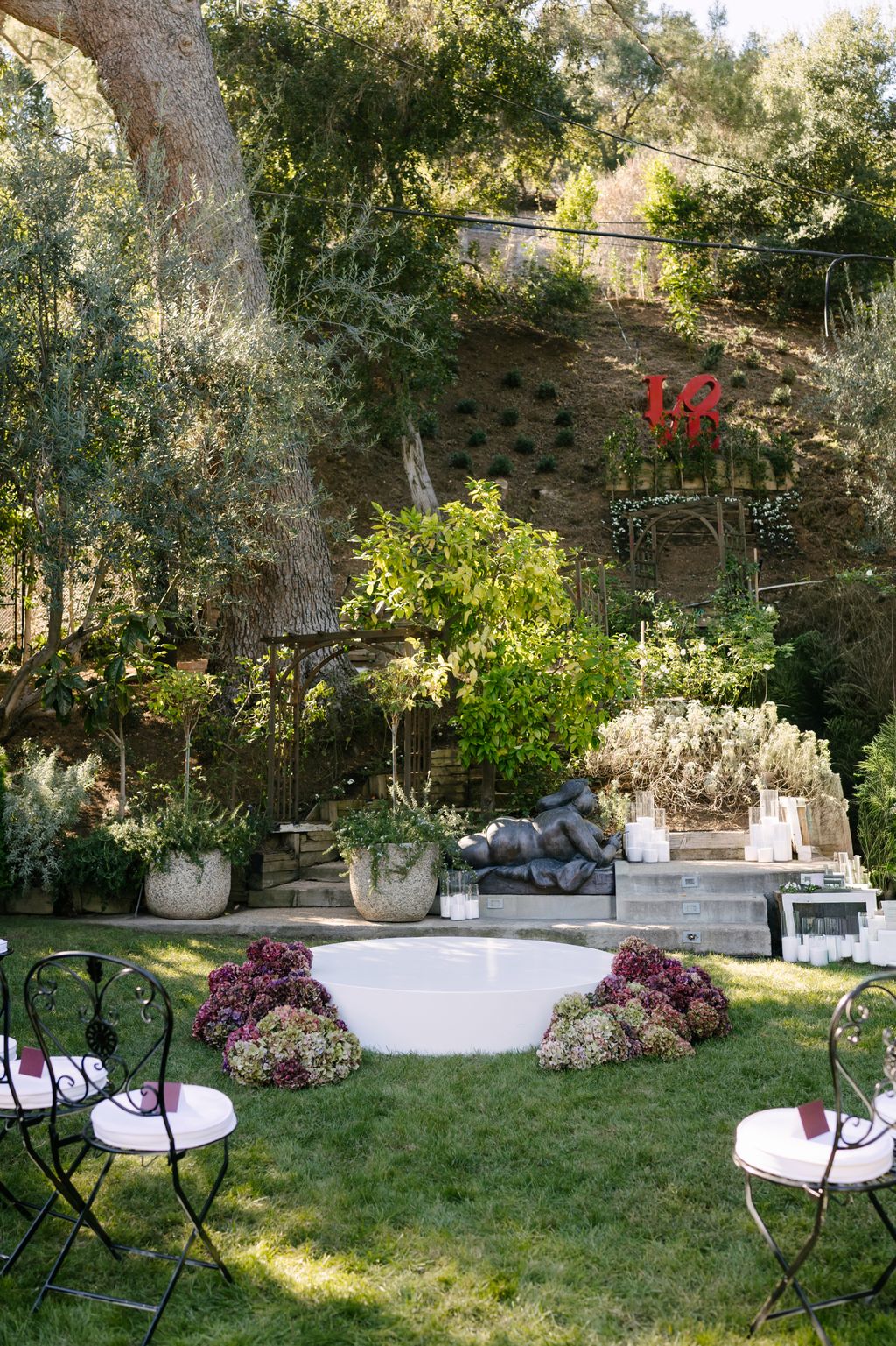Hydrangeas and candles decorated the ceremony space.