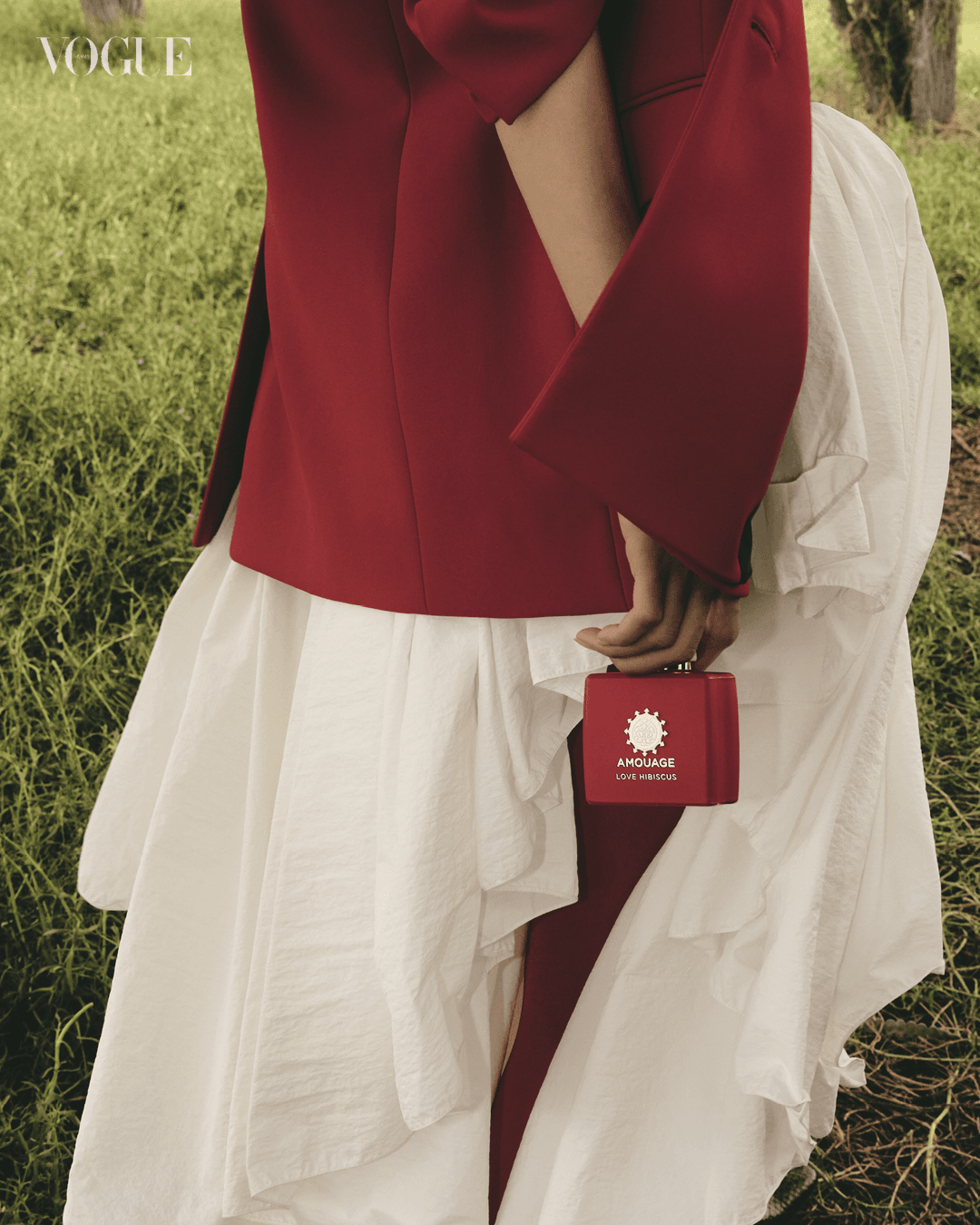 Love Hibiscus Fragrance Amouage. Blazer Bouguessa. Skirt Alaïa.